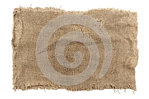 Burlap texture. A piece of torn burlap on a white background. Canvas. Packing material