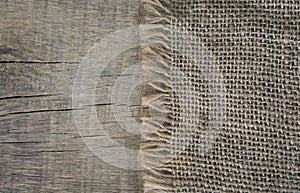Burlap textureon a wooden background, rustic, christmas . Pattern fabric textile. Texture background