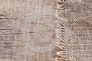 Burlap textureon a wooden background, rustic, christmas . Pattern fabric textile. Texture background