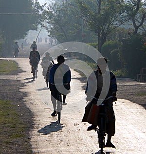 Burmese cycling to work & school