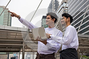 Burmese or Myanmar businessmen in city