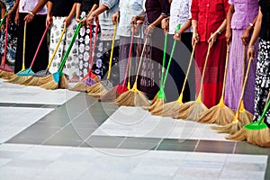 Burmese women washing the floor at Shwedagon Paya, Myanmar