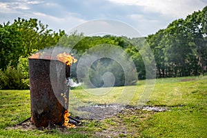 Burn barrel in a rural area used to incinerate trash and garbage.