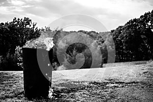 Burn barrel in a rural area used to incinerate trash and garbage.