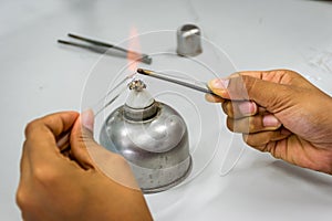 Burn dropper by alcohol bunsen burner