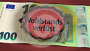 Burn hole in 100 euro note and German word \