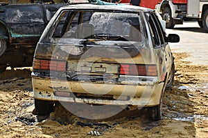 Burned broken car after a car accident