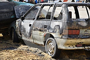 Burned broken car after a car accident