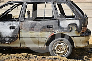 Burned broken car after a car accident