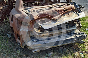 Burned car with back side burnt completely