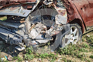 Burned car with burnt backside