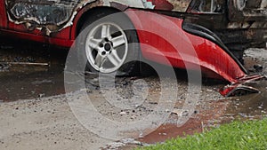 Burned car after the fire, automobile was not insured