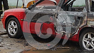 Burned car after the fire, automobile was not insured