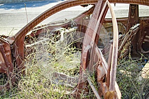 Burned car lying in jungle for long time