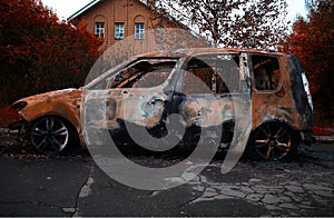 Burned car in traffic accident transport background