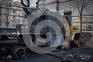 Burned cars on the streets of the city during protests on EuroMaidan. photo