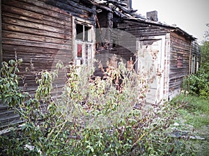 burned-down wooden house