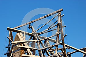 Burned house against blue sky