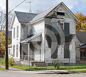 Burned Out & Boarded Up House