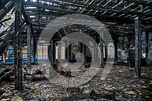 Burned-out ruins of mansion interior after fire