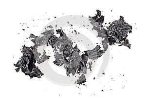 Burned paper on white background, top view photo