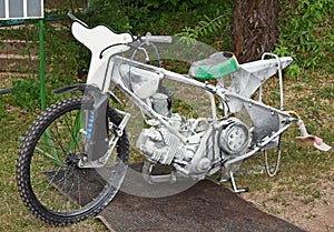 Burned speedway motorcycle after inoculation