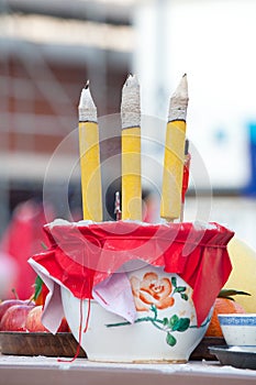 Burned yellow incense sticks