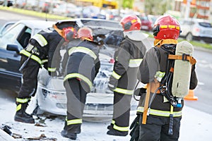 Burning automobile after extinguishing a fire at city street