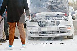 Burning automobile after extinguishing a fire at city street