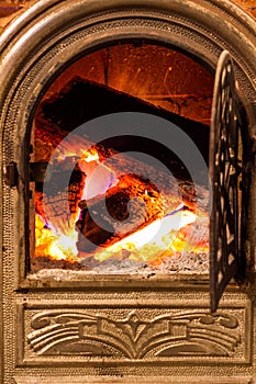 Burning billets in hot stove