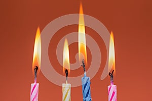 Burning birthday candles close up macro shot