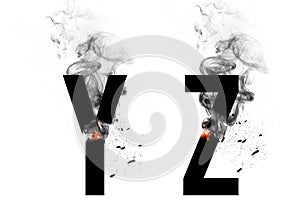 Burning black letters  Y, Z. Smoke Font. Alphabet breaks down with small fire and smoke.