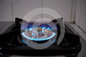 Burning blue flames from a kitchen gas stove