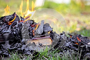 Burning books on the street, destroying old books photo