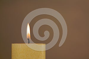 Burning candle with copy space