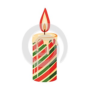 A burning candle decorated with green, red stripes