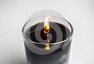 When burning candle  let top layer melt through so the wick will last longer .