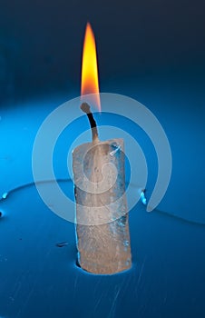 Burning candle made of ice