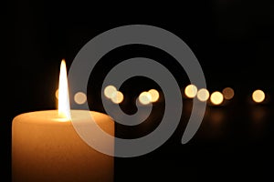 Burning candle at night