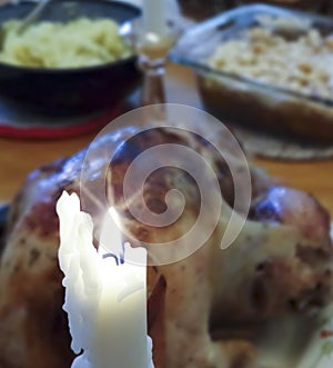 A Burning Candle on a Thanksgiving Table