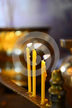 Burning candles Buddha Statue