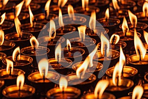 Burning candles in Buddhist temple