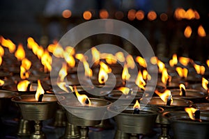 Burning candles in a Buddhist temple