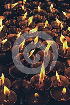 Burning candles at a Buddhist temple