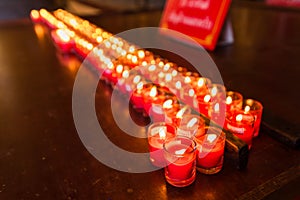 Burning candles at a Buddhist temple,Lighting of Praying candles