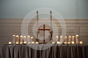 Burning candles on church altar