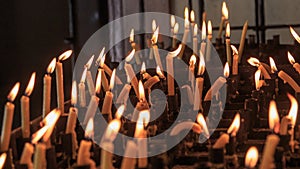 Burning candles in a church on Kyat island