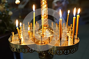 Burning candles in the church . religion concept , celebration christmas