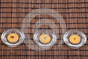Burning candles in decorative candleholders