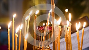 Burning candles in Orthodox Christian church